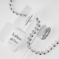Lakier hybrydowy Kabos Gelike 044 Starlight Silver z brokatem 8 ml