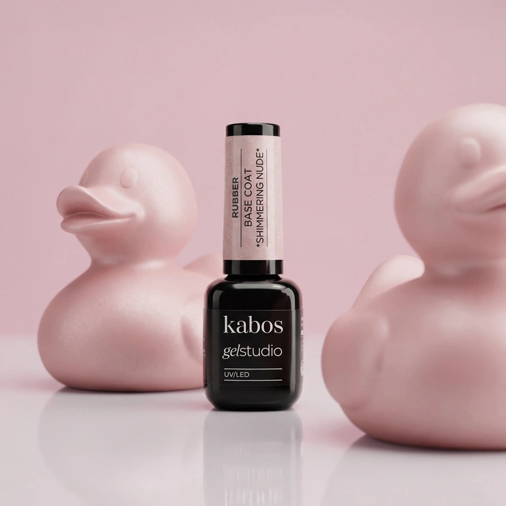 Kolorowa baza hybrydowa Kabos Gelstudio Rubber Base Coat Shimmering Nude z brokatem 10 ml