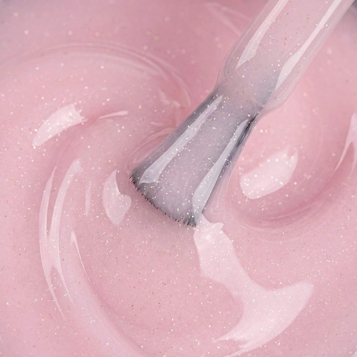 Kolorowa baza hybrydowa Kabos Gelstudio Rubber Base Coat Shimmering Blush z brokatem 10 ml